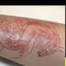 Дара си татуира дракон 