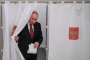 Путин печели със 76,5%